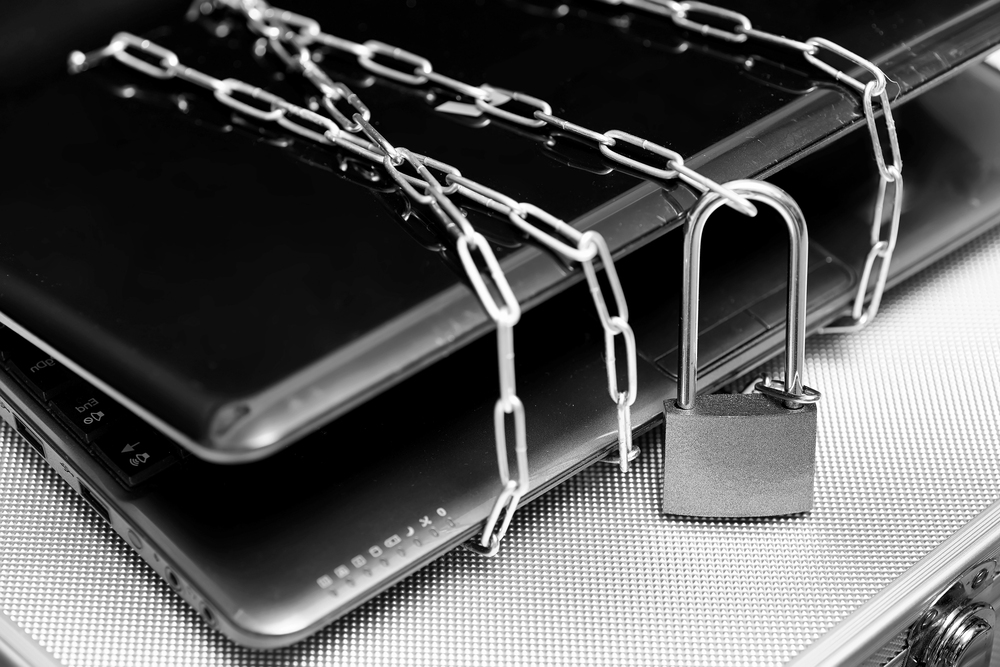 A laptop locked indicating that the business was banned