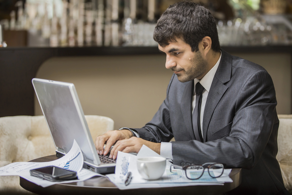 A businessman conducting a high-risk transaction