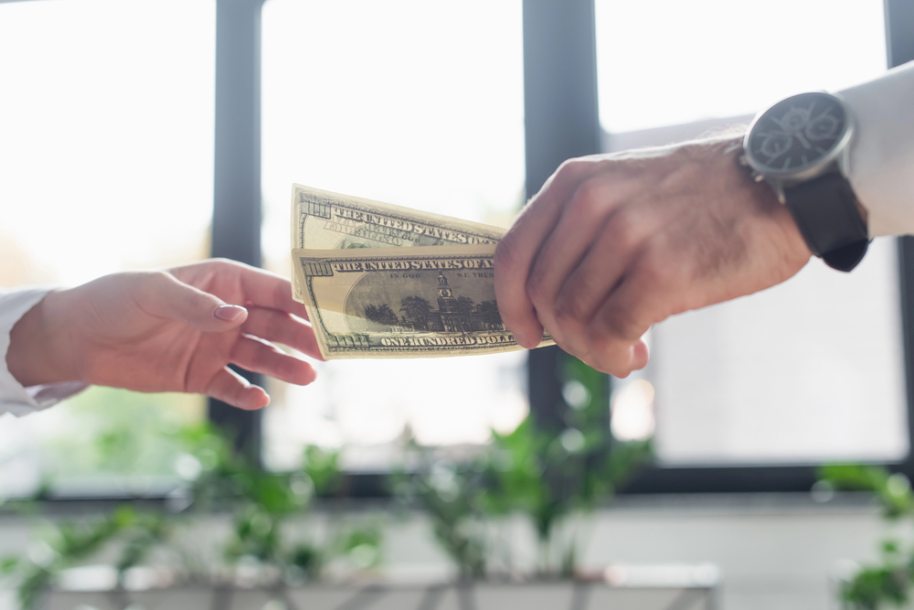 A cash transaction between two people.